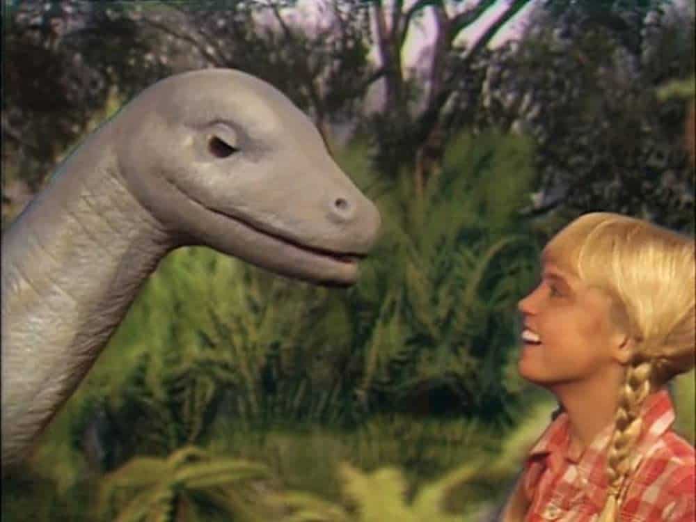 Holly (Kathy Coleman) encounters a friendly dinosaur on "Land of the Lost."