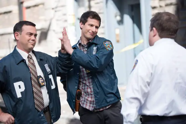 In the TV series "Brooklyn Nine-Nine," the characters were often giving each other high-fives.
