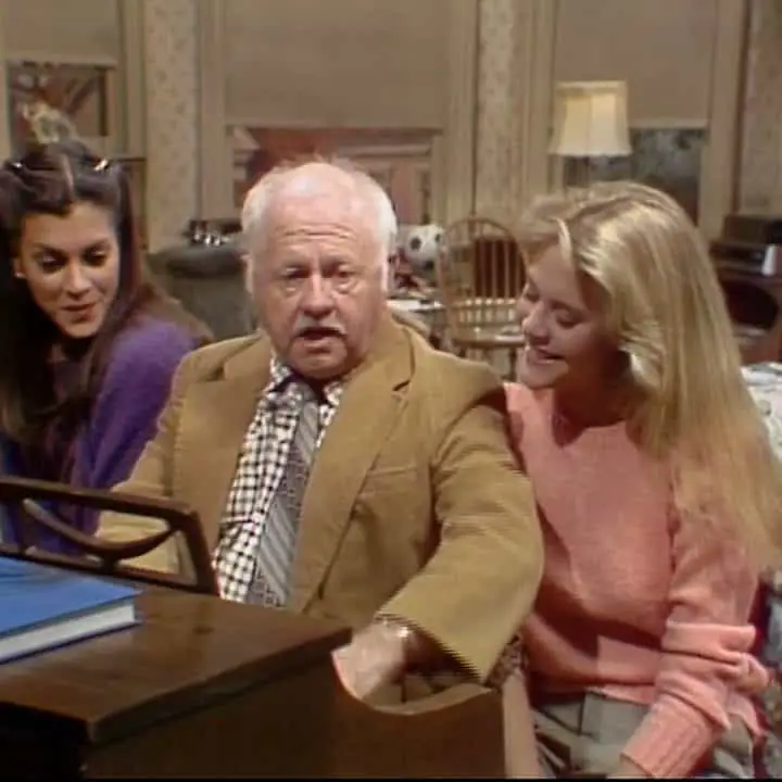 A photo of Wendie Malick, Mickey Rooney and Meg Ryan in the 1982 sitcom, "One of the Boys."